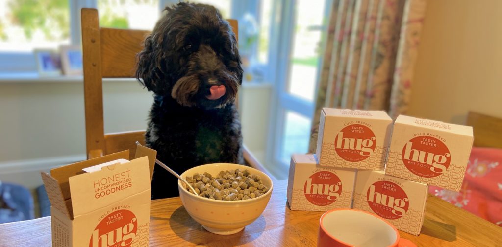 Meet Vicky: Hug creator, pet lover, eco-advocate. 3 Fletcher eating Hug